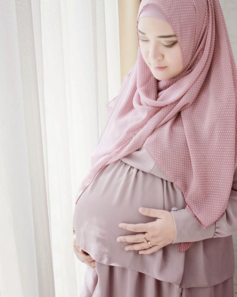 أزياء وفساتين فترة الحمل للمحجبات 2019 24