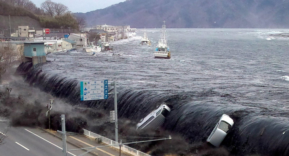 ضربات الشمس والفيضانات تضرب اليابان