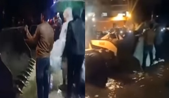 بالفيديو والصور "زفاف عروسين على لودر" عروسان مصريان يتحديان السيول والأمطار 1
