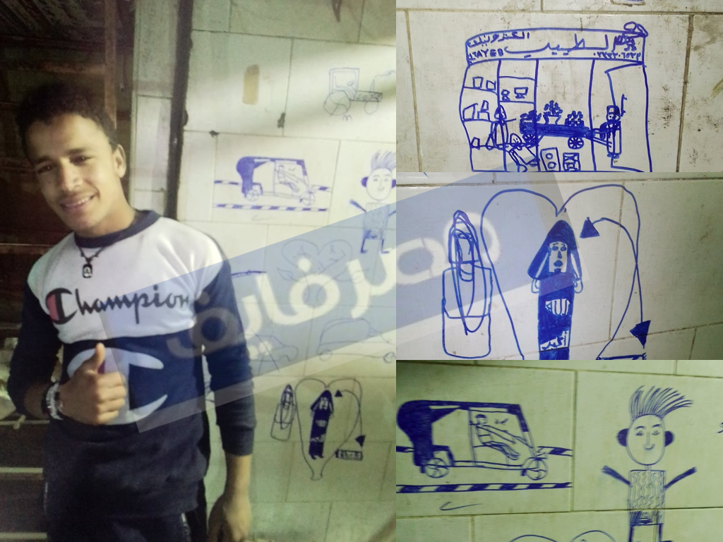 عبد الرحمن عبد النبي بجوار مجموعة من رسوماته على جدران منفذ الخبز