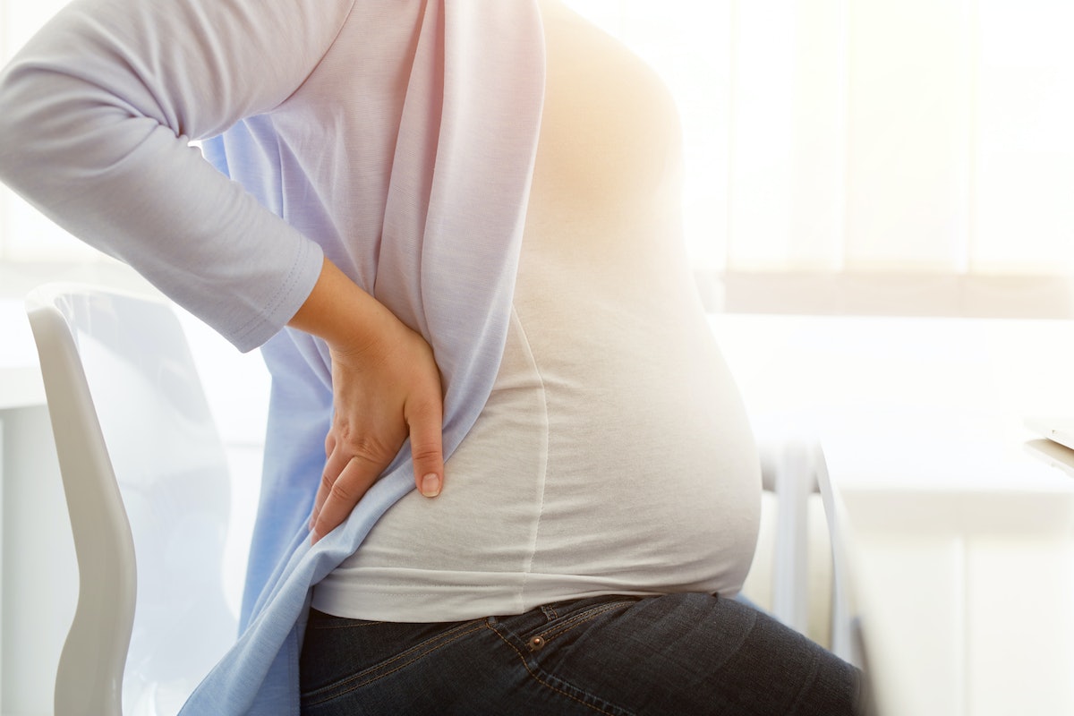 Болит поясница беременность 39. Боль в спине при беременности. Спина беременной. Боль в пояснице у беременных.