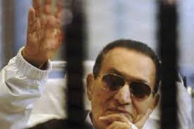 تحليل  إبتسامة مبارك من خلف القفص